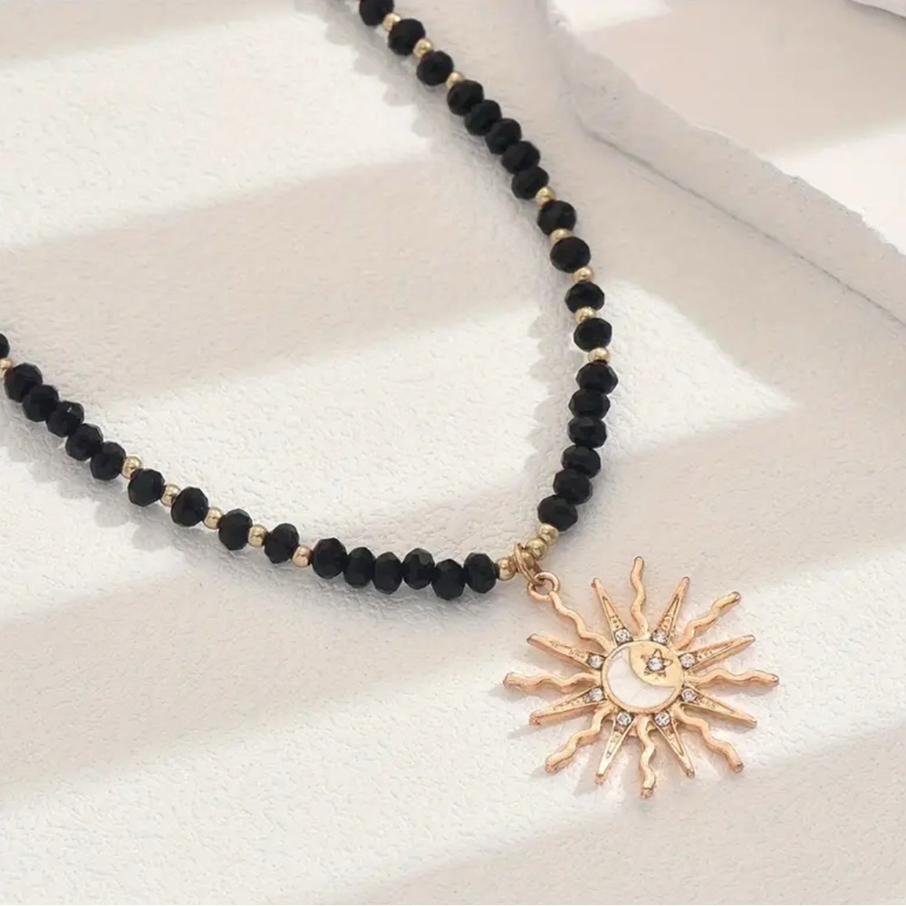 Black‎ and Gold Sun Pendant Necklace